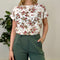 T-shirt in fantasia floreale