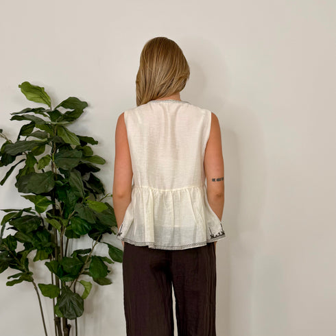 Blusa con ricami