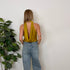Top halter con scollo