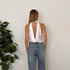 Top halter con scollo