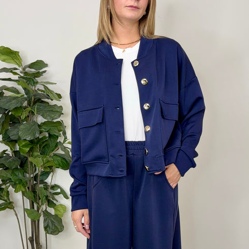 COORDINATO IN NEOPRENE CON BOTTONI