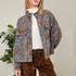 BOMBER IN DENIM CON EFFETTO DAMASCATO
