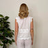 Camicia smanicata con ricami