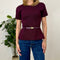 TOP IN MAGLIA CON CINTURA.