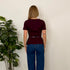 TOP IN MAGLIA CON CINTURA.